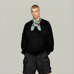 Mlle Ceinté Paris silk scarf, jumping horse with floral pattern coat, navy blue saddle and orange trim, sage green grid background.